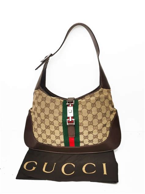 gucci borsa a spalla vintage|Borsa a spalla vintage con lucchetto, 2001 .